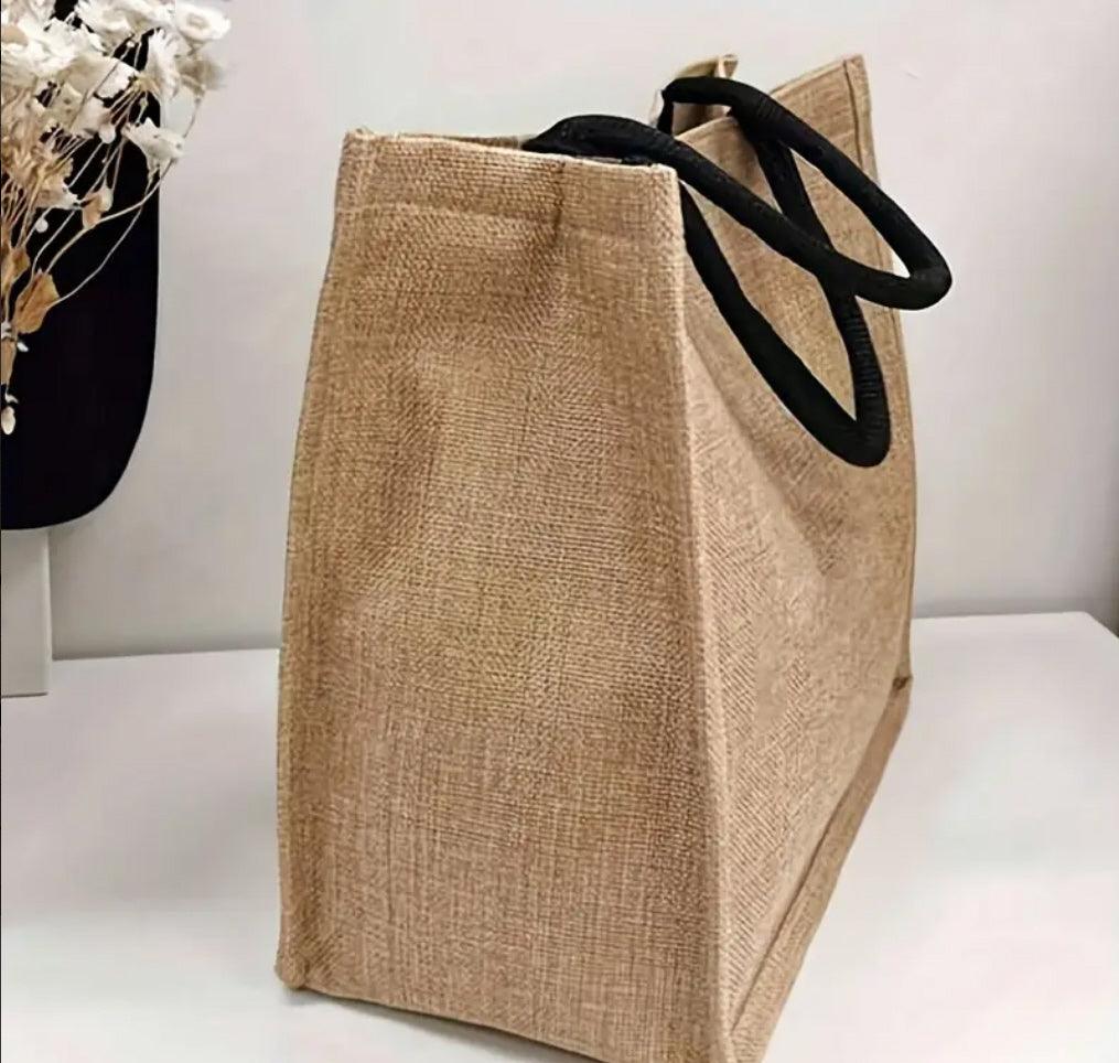 Blumige Tragetasche mit 'Mama'-Aufdruck